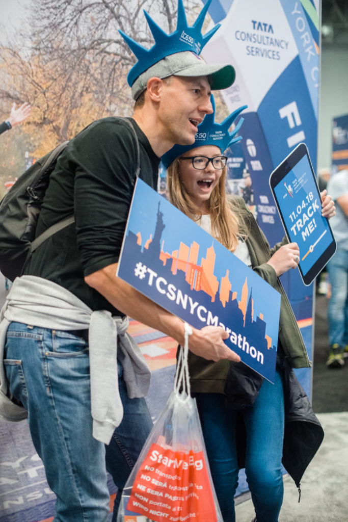 two people holding a sign