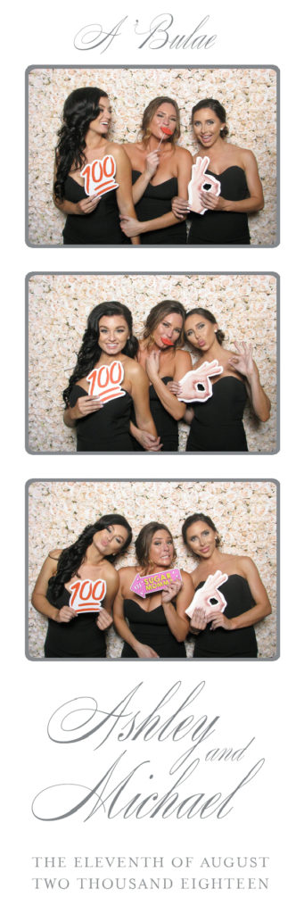 Three photos of three women smiling and holding signs