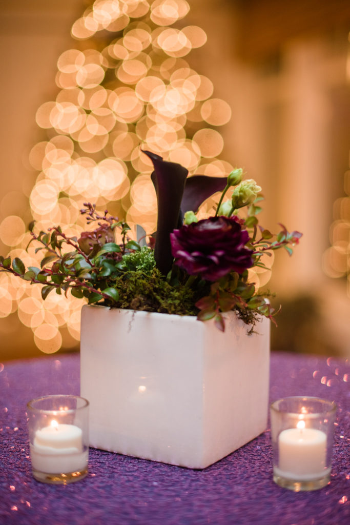 Flowers on a table in a white vase 