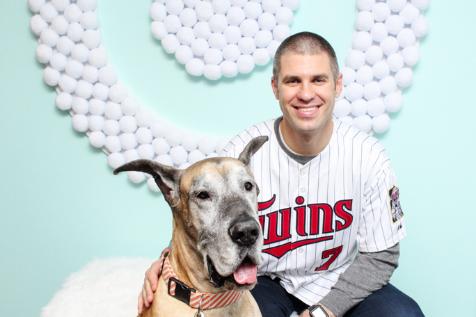 Smiling man with a dog 