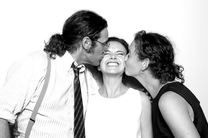 a photo of three people in black and white