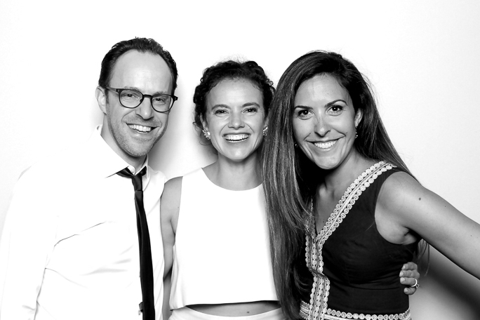 Three people smiling for a photo