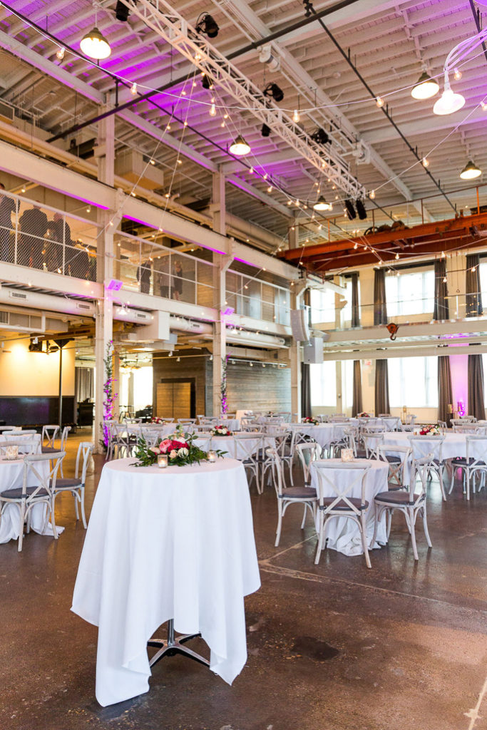 Tables with white cloths and flowers 