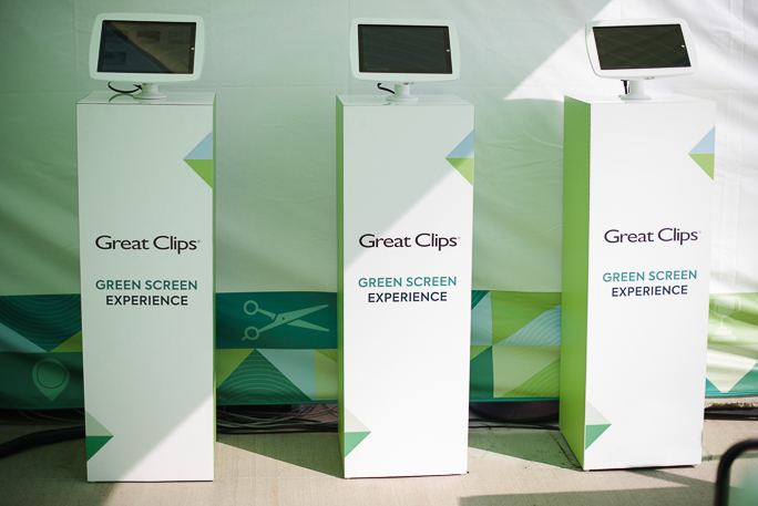 three kiosks with tablets