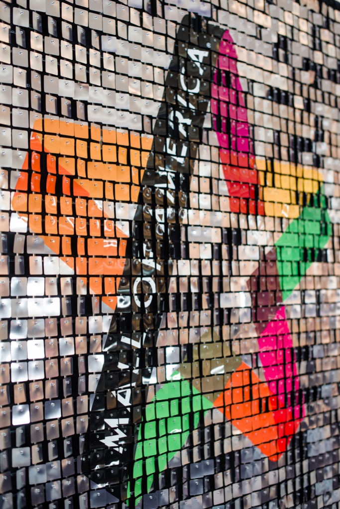 Detail of a shiny backdrop with tiles