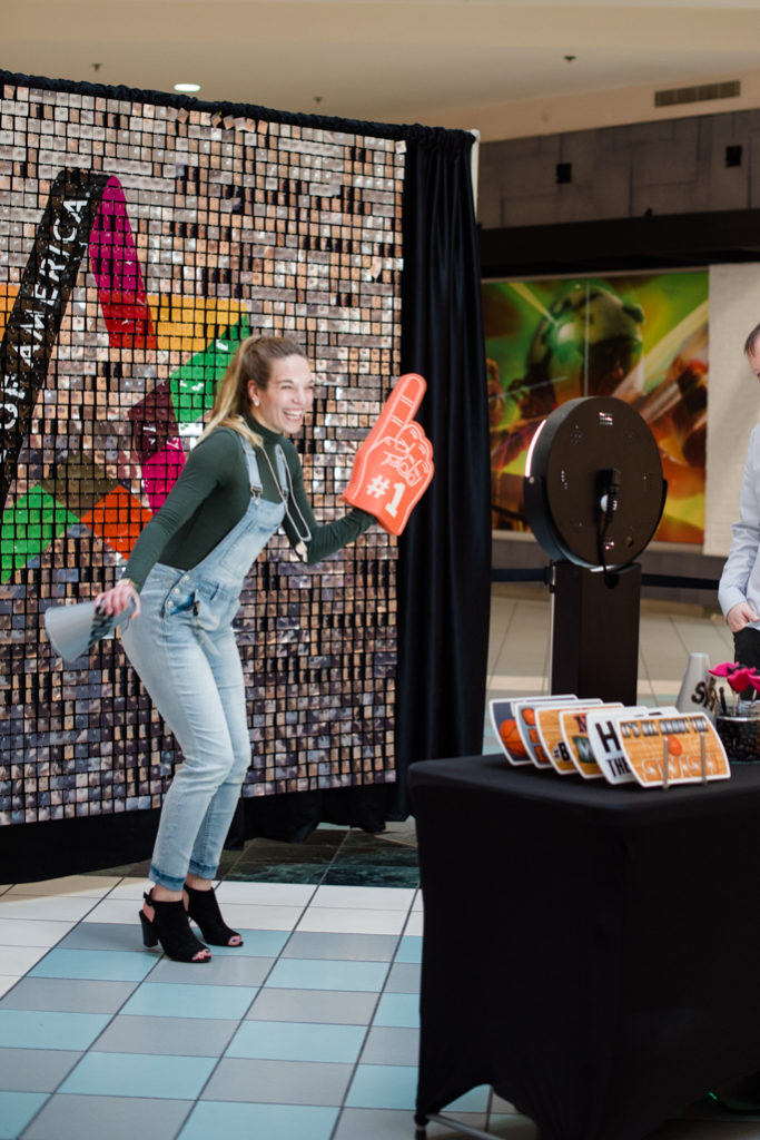 A women posing for photos with props