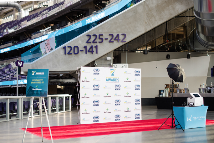 Photo fo a red carpet and a backdrop