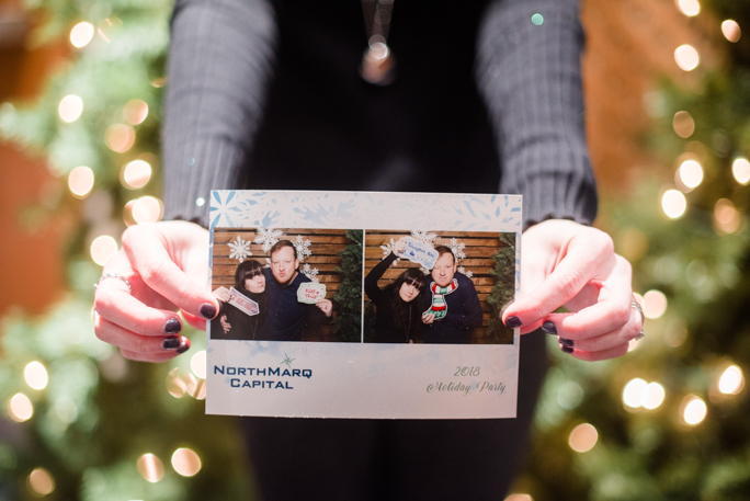 Hands holding a photo