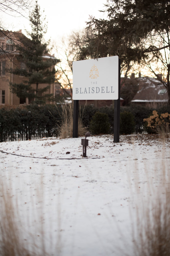 A white sign on a snowy background
