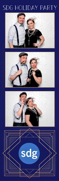 A couple posing for photos and smiling
