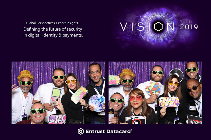 A group of people with signs and in sunglasses