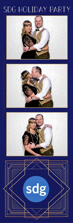 A couple smiling and posing for a photo
