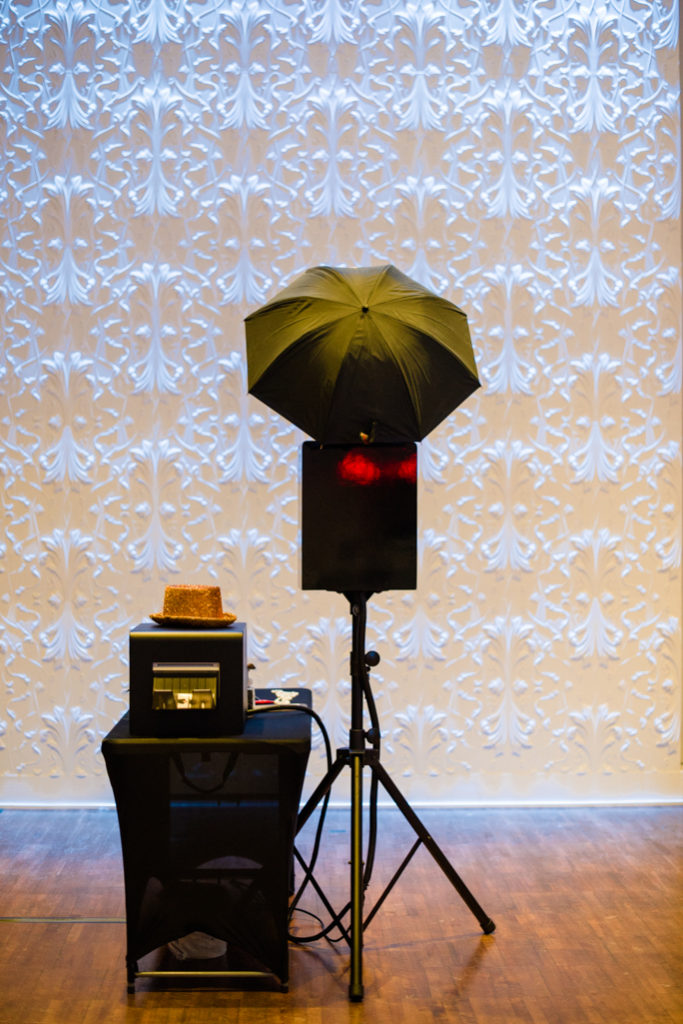 A photo station next a white background