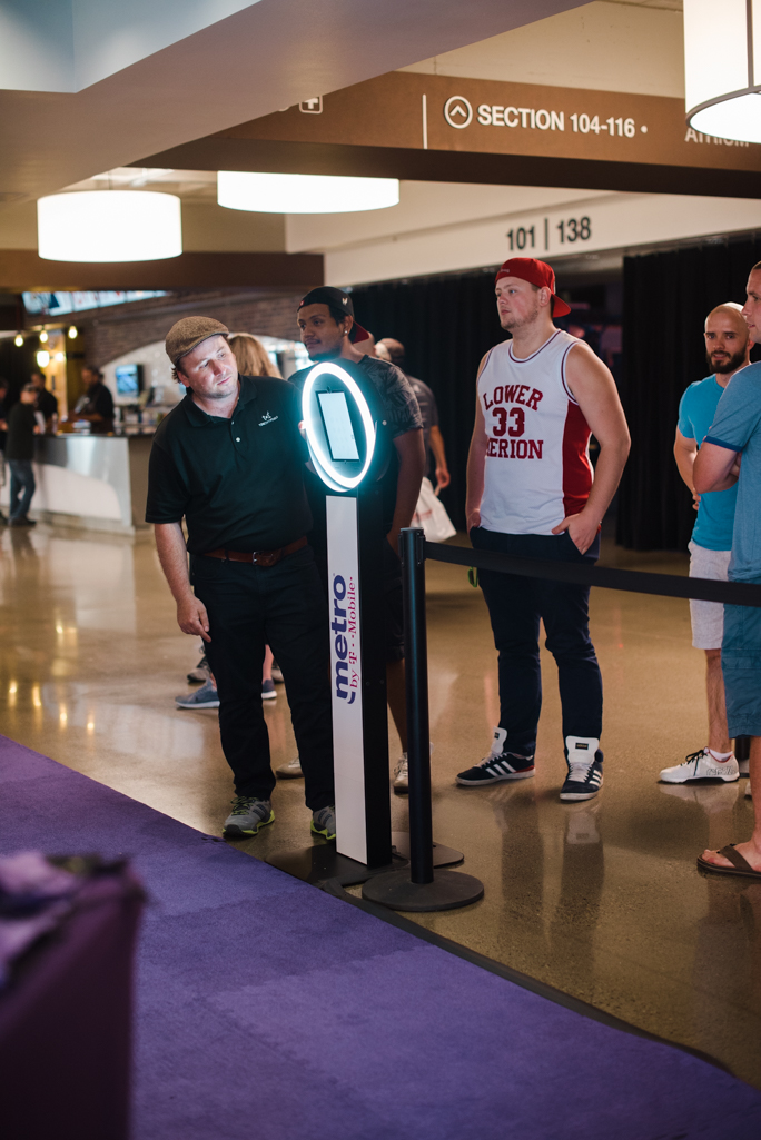 A person next to a kiosk 