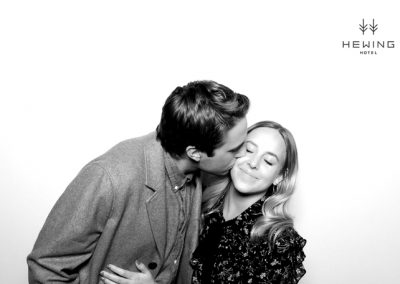 Man kissing women on a cheek