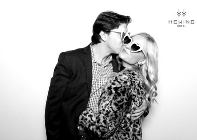 Man kissing women on a cheek