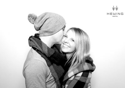 Man kissing women on a cheek