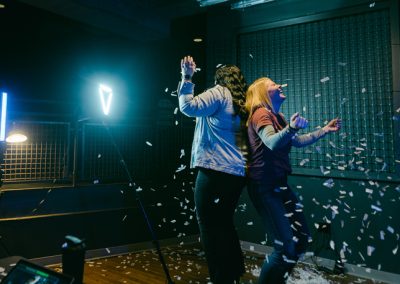 Women throwing confetti