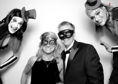 People smiling for black and white photo