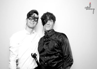 Two men smiling