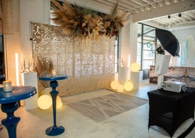 Open Style Photo Booth Next to a Backdrop