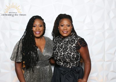 Two smiling women