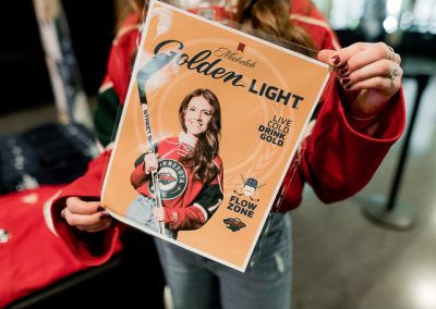 A person holding a poster