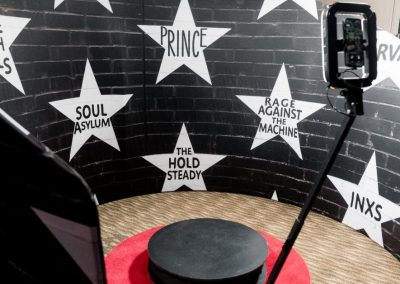 360 photo booth with rotating platform and ring light set up for a corporate event in Minneapolis
