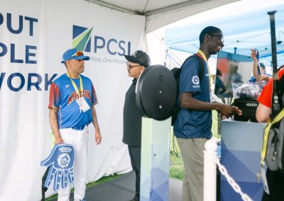 Attendees using a branded photo booth at a PCSI corporate brand activation