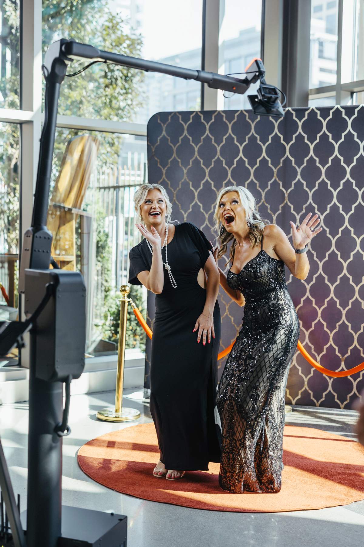 Guests posing for a Glambot slow motion video booth in Minneapolis