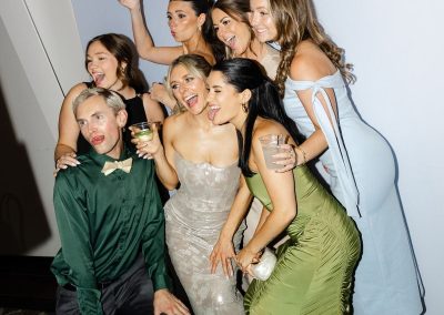 Wedding party group photo taken in an open style photo booth and shared on social media