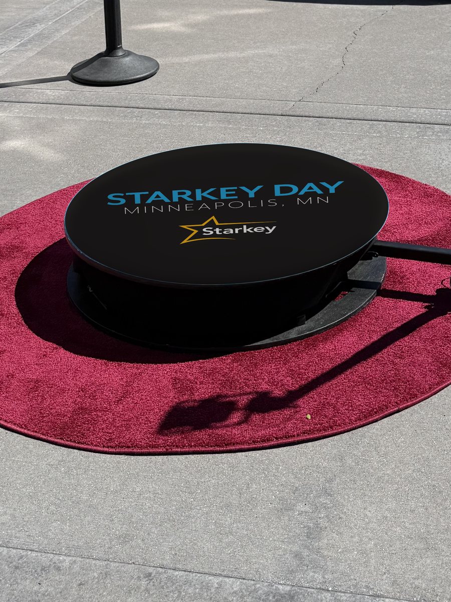 360 photo booth platform printed with a custom wrap: logo for a corporate event