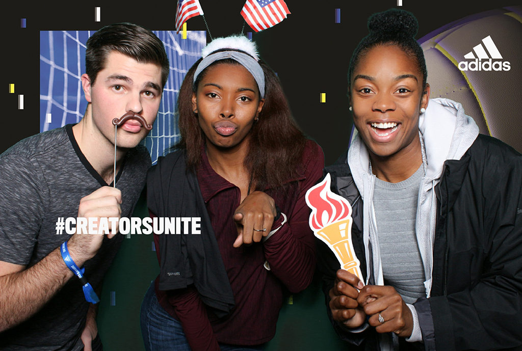 Adidas brand event green screen photo of three guests with mustache and torch props