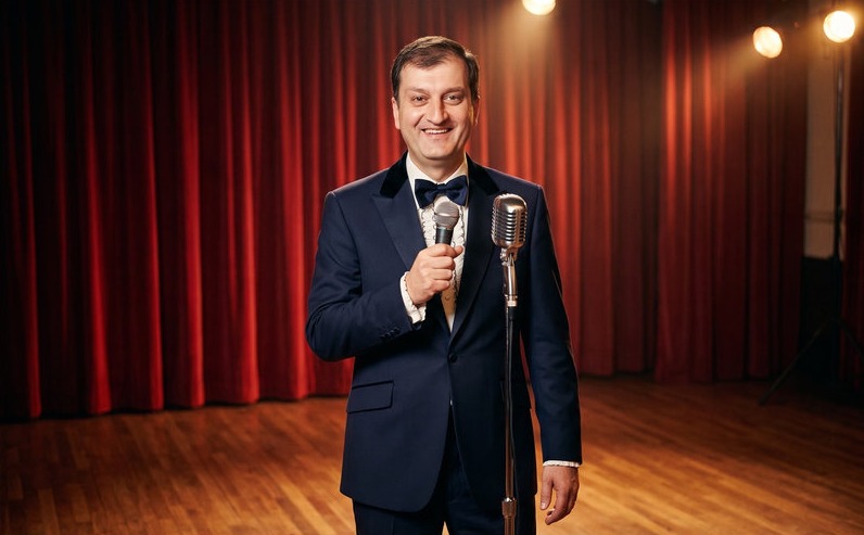 AI photo booth guest as a lounge singer on a red curtain stage
