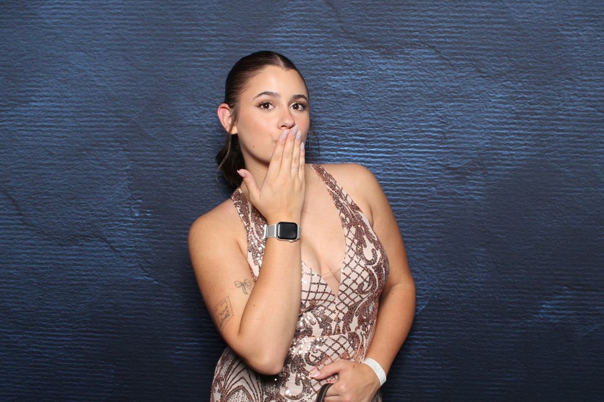 Guest photographed at the photo booth before the AI transformation