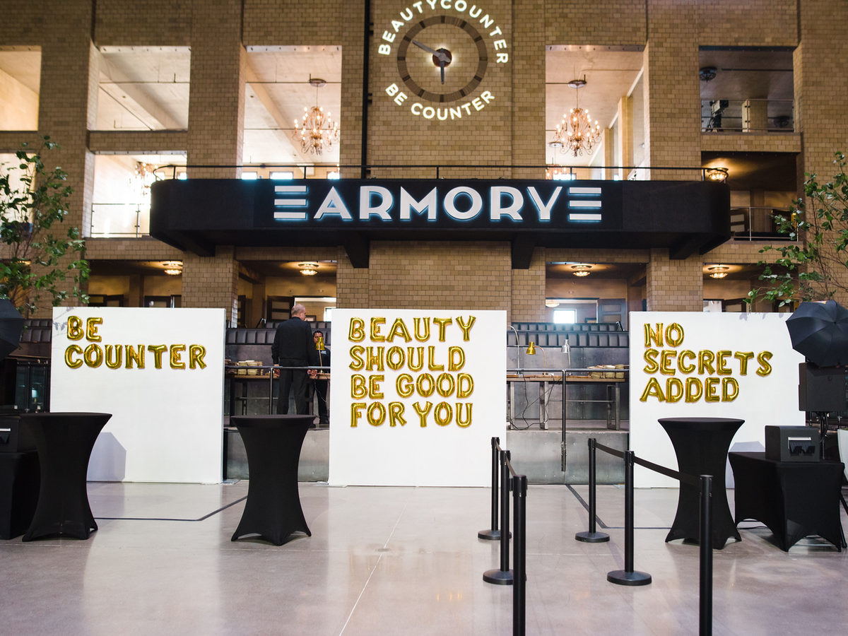 Retail pop up brand activation with multiple open style photo booths and branded signage