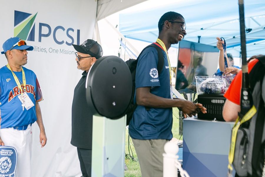 Guests at a corporate branded photo booth activation for PCSI