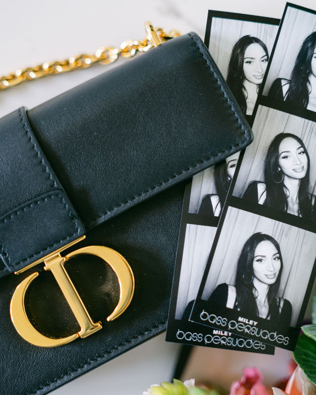 Black and white photo strips from an enclosed photo booth at a fashion brand event