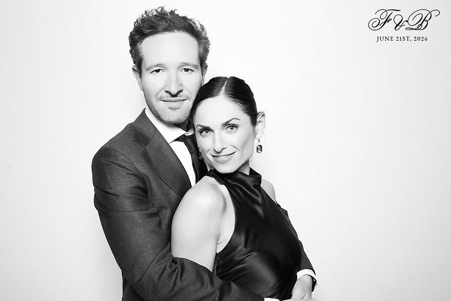 Black tie couple portrait from a glam photo booth, black and white with soft retouching