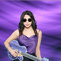 Guest with a guitar on a custom purple green screen background