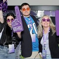 Green screen photo strip frame of guests in football jerseys at a stadium scene