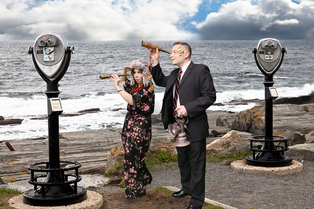 Immersive green screen photo of a couple with spyglasses at a rocky ocean lookout