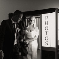 Black and white wedding photo next to a traditional photo booth