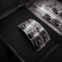 Unlimited black and white photo strips from an enclosed photo booth