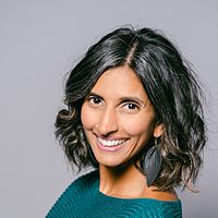 Smiling professional headshot from an event headshot station
