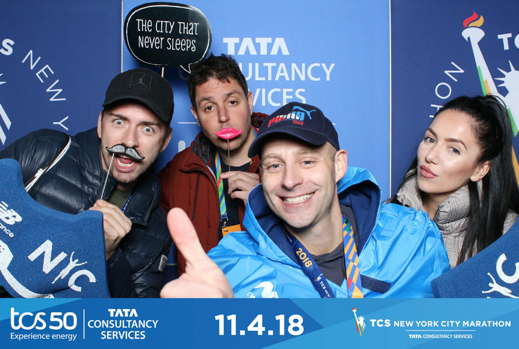 TCS New York City Marathon expo print of runners with mustache and lips props