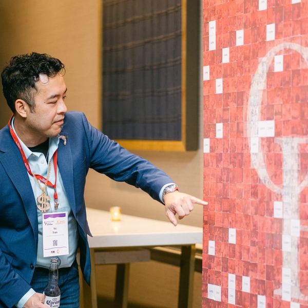 Photo mosaic wall corporate event by Time Into Pixels