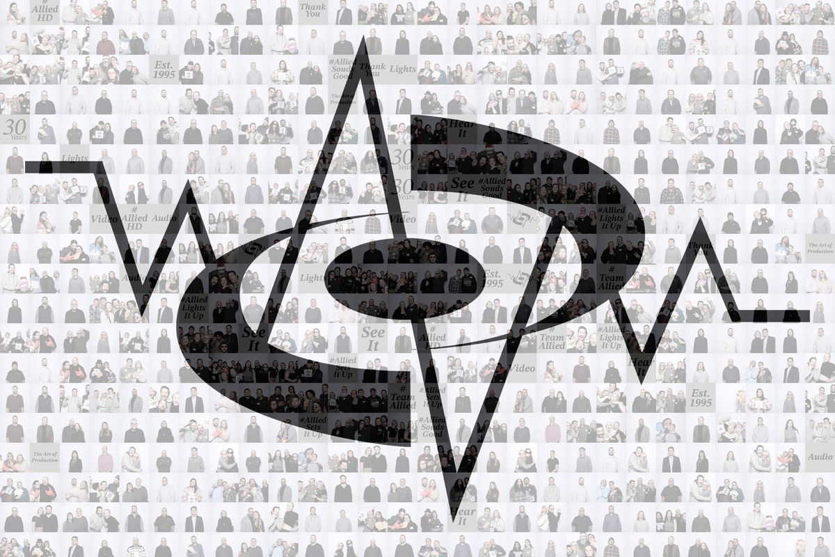 Finished photo mosaic wall forming a black music logo from hundreds of guest photos